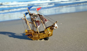 toy-ship-seashore